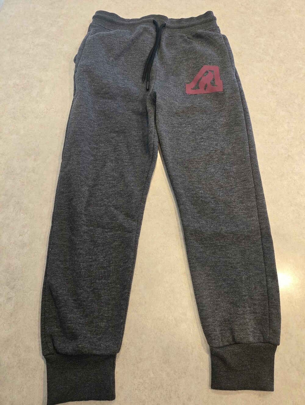 Anoka Tornadoes (Minnesota) Gray Jogger Sweatpants with Maroon Logo. Youth XL